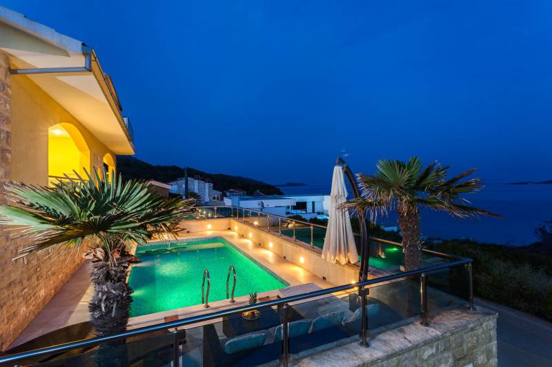 Pool terrace of Beachfront Villa Sea Sound on Korcula Island by night