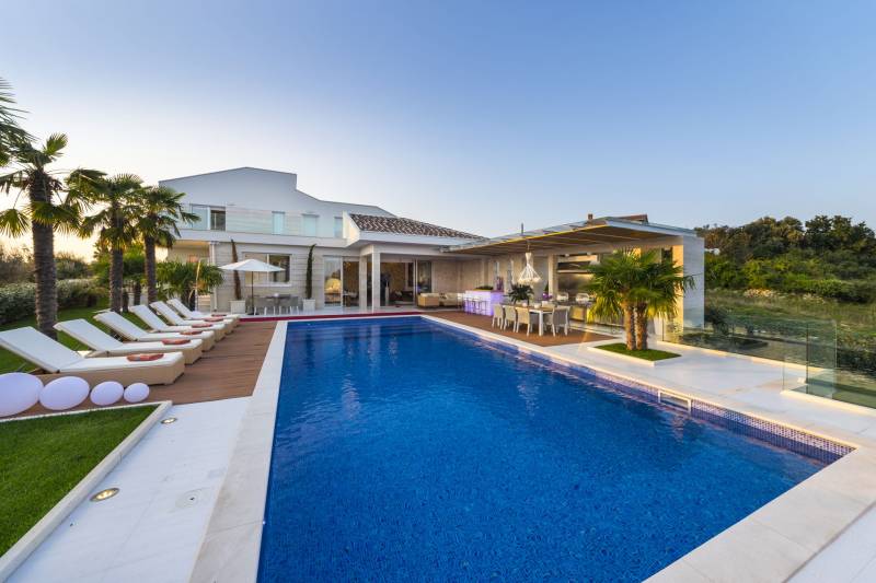 Terrace, garden and swimming pool of Luxury Villa Beyond near Zrce beach in Novalja, Croatia