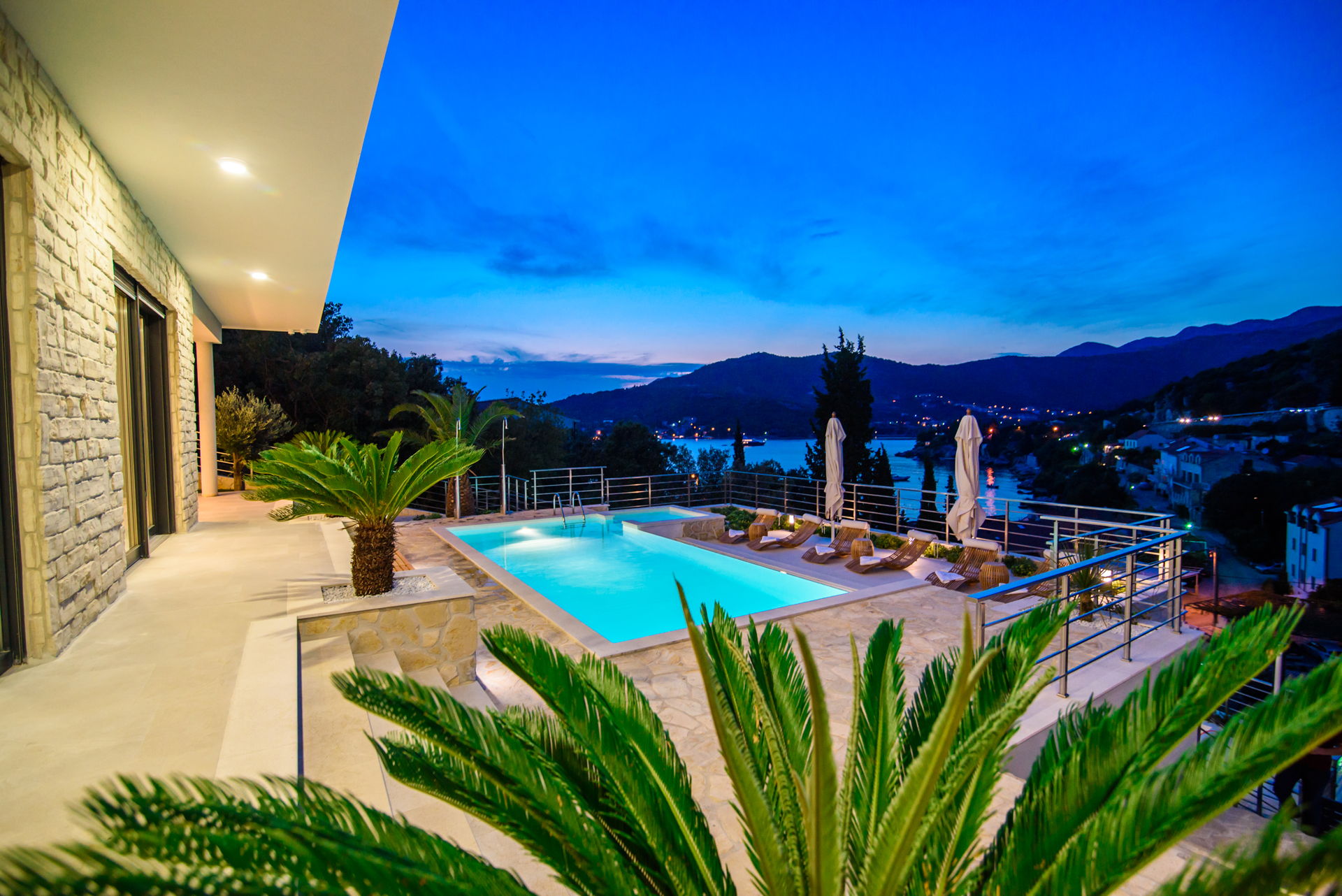 Panoramic view from the  pool terrace of Luxury Villa Neptune in Dubrovnik Riviera by night