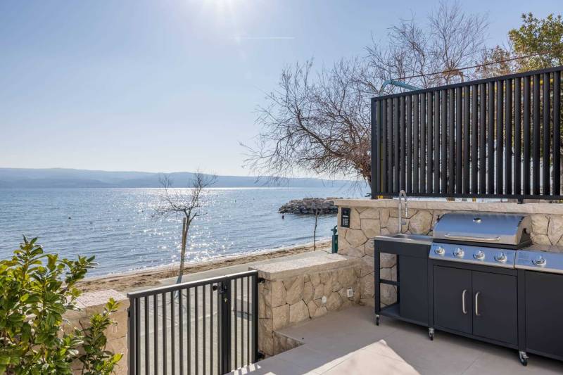 Beachfront Villa Stellar Sea with Pool Omiš